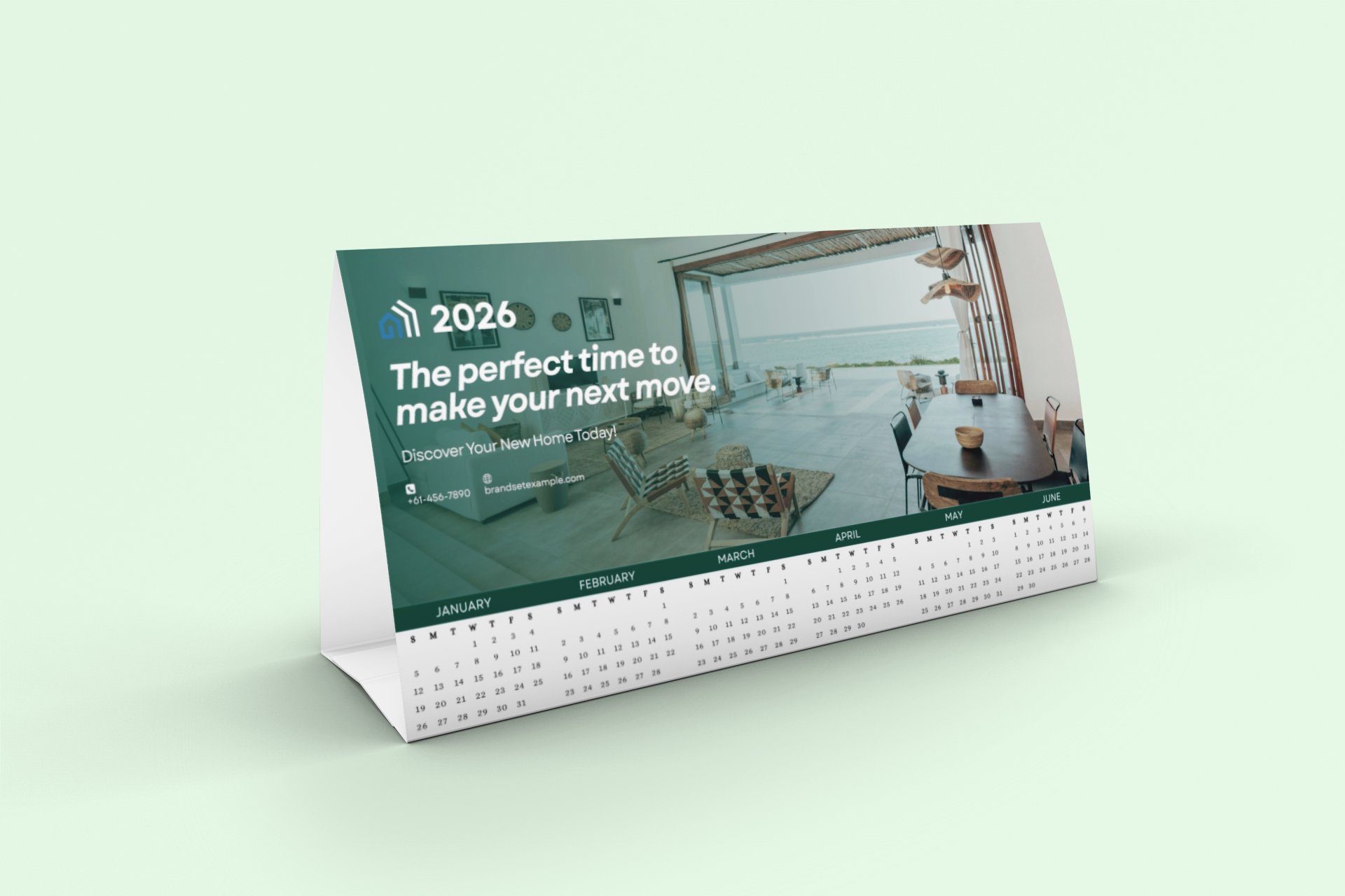 2026 branded tent calendar mockup featuring a modern coastal home interior and full-year layout.